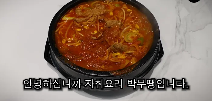 Add the pork neck and brown it in the pot.