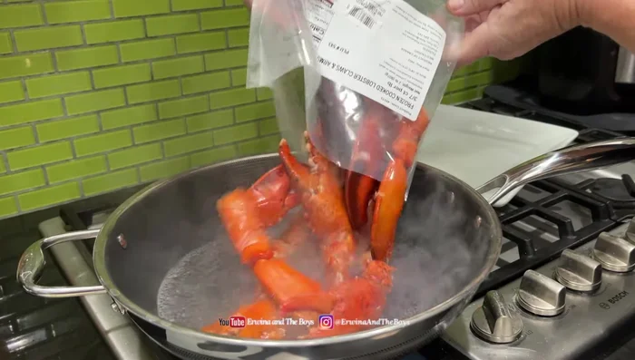 Boil a pot of water, then add the lobster and cook for about 3 minutes. Strain the lobster, reserving some of the cooking liquid.