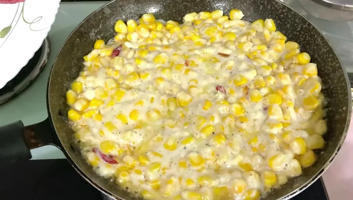 Reduce heat to low, cover, and simmer for 5 minutes.