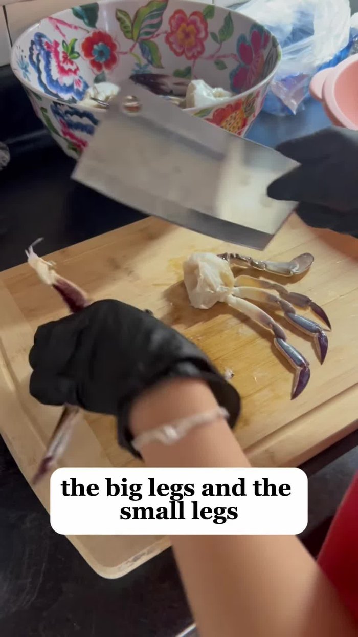 Cut off the big and small legs and extremities of the crabs. Remove any spiky things on the big legs.