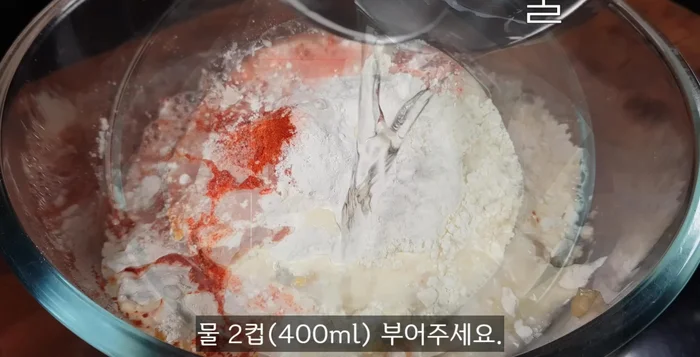 Mix well until all ingredients are evenly combined and the dough is smooth; avoid lumps.