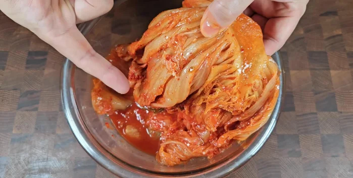 Wash the seasoning from the kimchi to remove excess salt and strong flavors.