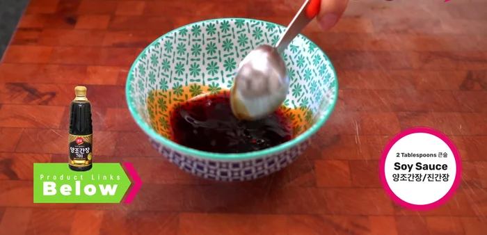 Prepare the soy sauce seasoning: Combine soy sauce, cooking wine (if using), brown sugar, garlic, oyster sauce, doenjang, bouillon powder, pepper, and hot water in a bowl. Stir until well mixed. (60.079)