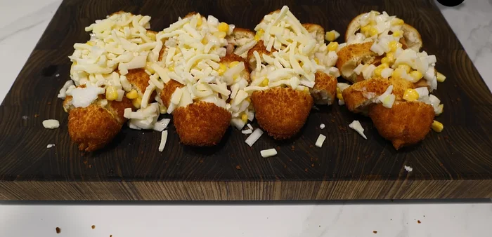 Microwave or air fry until the cheese melts.