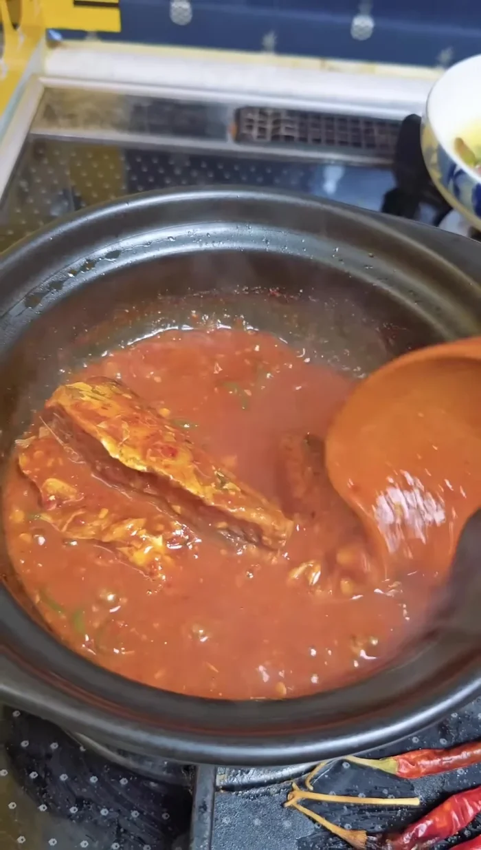 Add the chopped radish and onion to the pot.