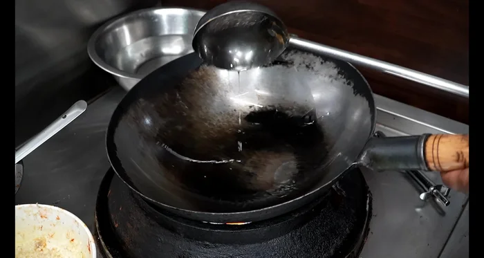Heat oil in a pan.
