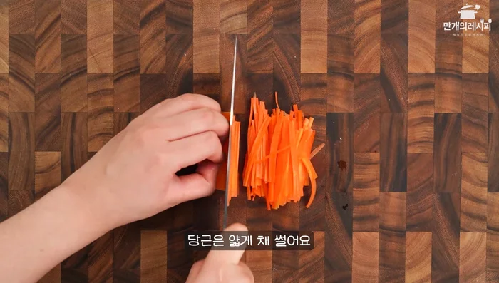 Mix the ingredients: In a bowl, combine kimchi paste, gochugaru, minced garlic, minced ginger, fish sauce (if using), and sugar (if using).