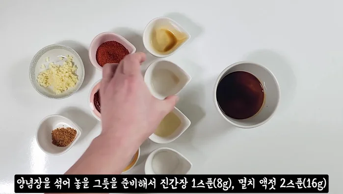 Prepare the seasoning: In a bowl, mix soy sauce, anchovy sauce, mirin, sugar, red pepper powder, red pepper paste, soybean paste, minced garlic, and beef broth. Refrigerate.