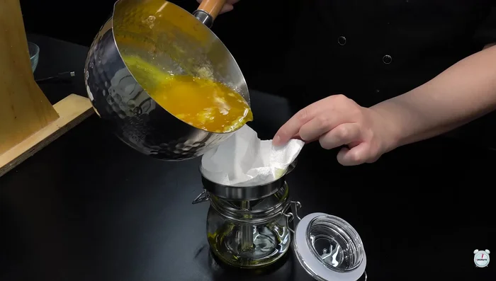 Strain the butter once with a kitchen towel to remove any impurities. This is the ghee.