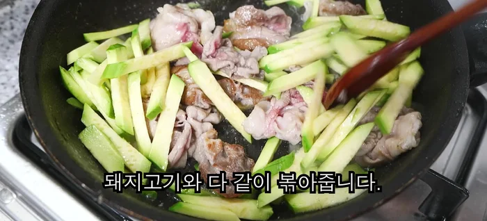 Add squid and stir-fry until softened.