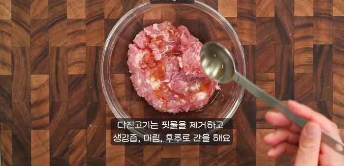 Prepare the sauce by mixing gochujang, soy sauce, sugar, sesame oil, minced garlic, and chopped green onions in a bowl. (Specific quantities and detailed instructions are missing from the transcript)