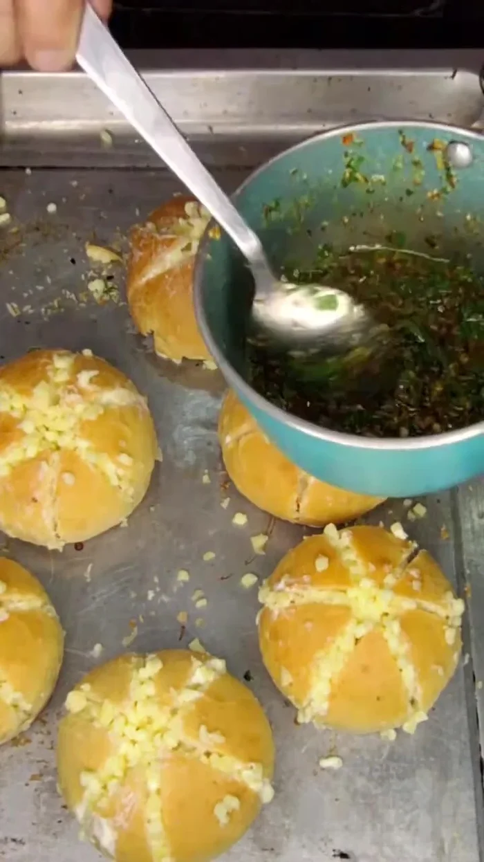 Dip or brush the filled buns with garlic butter.