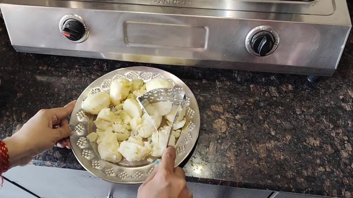 Boil 5-6 new potatoes until well cooked. New potatoes have less water content.
