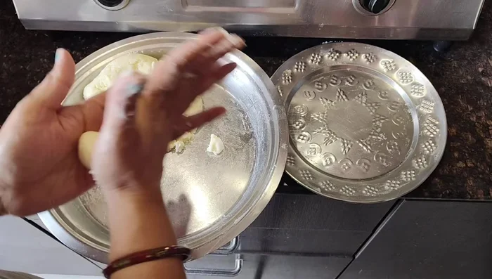 Roll the dough into small, round balls.