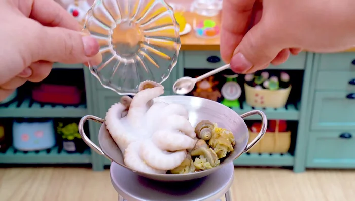 Add snails and octopus to the sauce; cover them with the sauce.