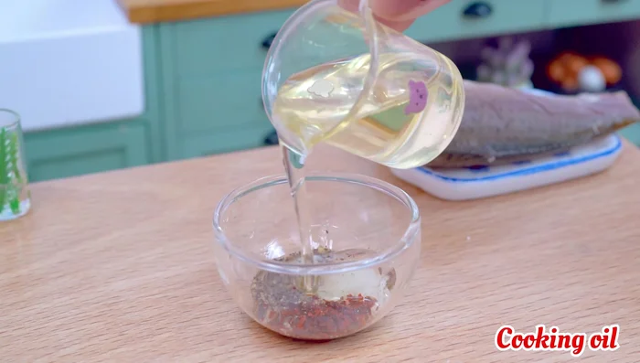 Marinate fish with salt, pepper, paprika, and lemon juice. Add cooking oil.