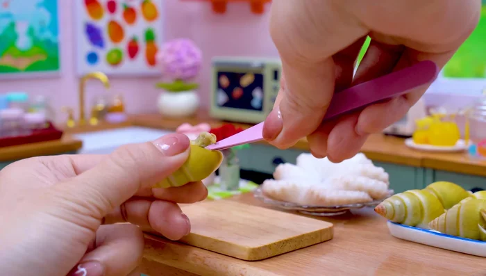 Remove snails from their shells.