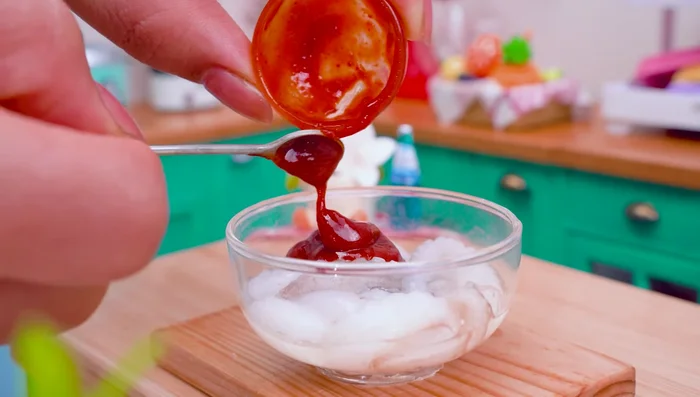 Marinate octopus with cooking oil, lemon, chili powder, minced garlic, pepper, and parsley.