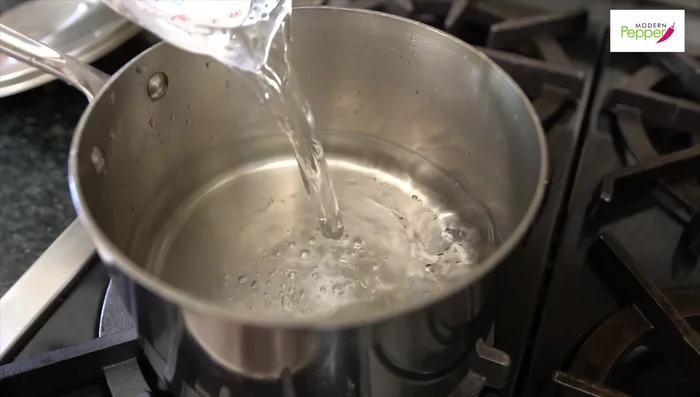 Prepare soy sauce broth: Combine water, soy sauce, cooking wine, brown sugar, kelp, garlic, and pepper. Boil for 15 minutes.