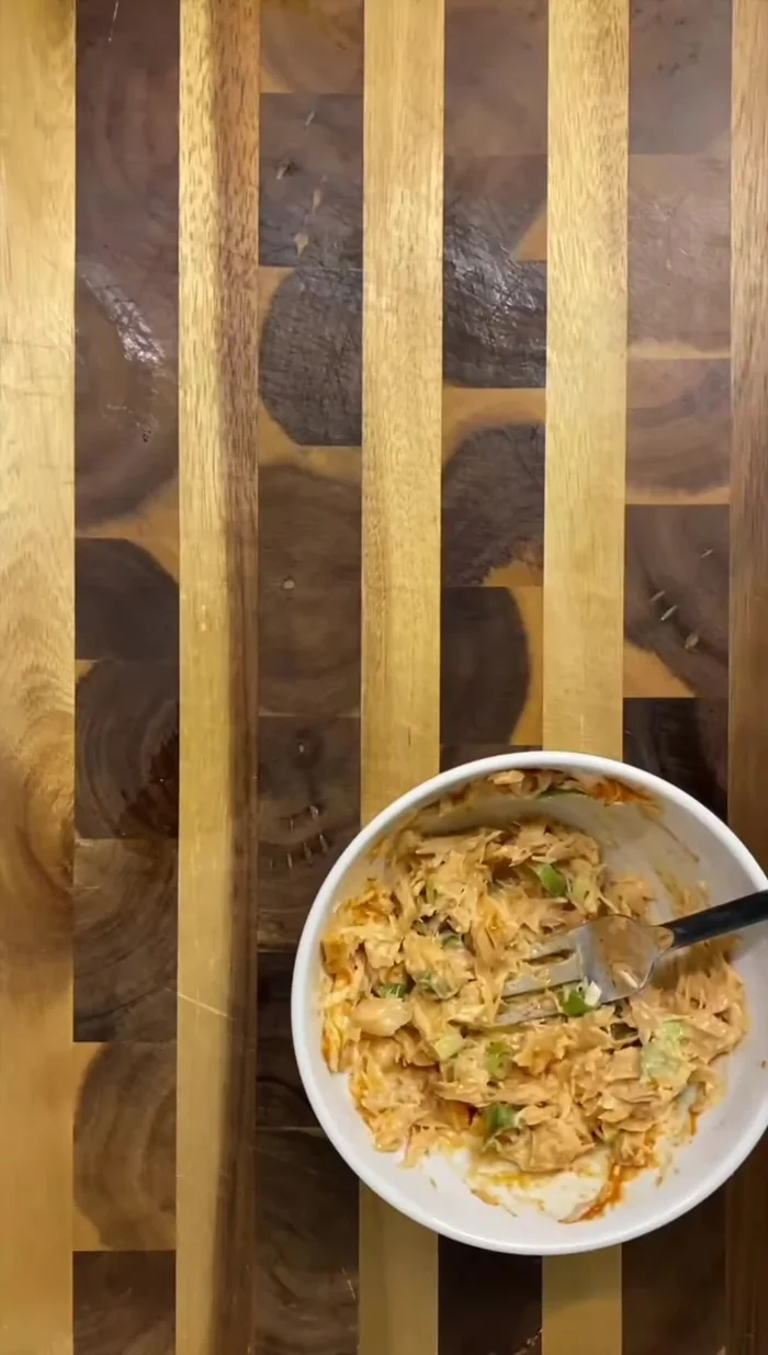 Add white rice to the uni mold.