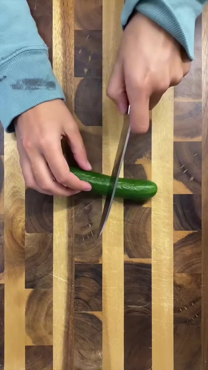 Make Korean cucumber salad (recipe not detailed in transcript).