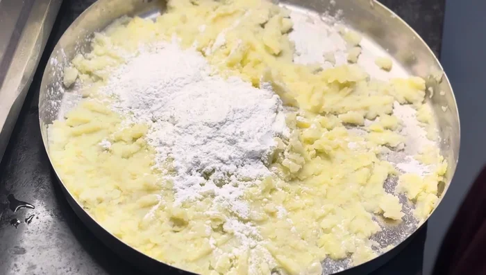 Add three to four spoons of corn flour and mix well.