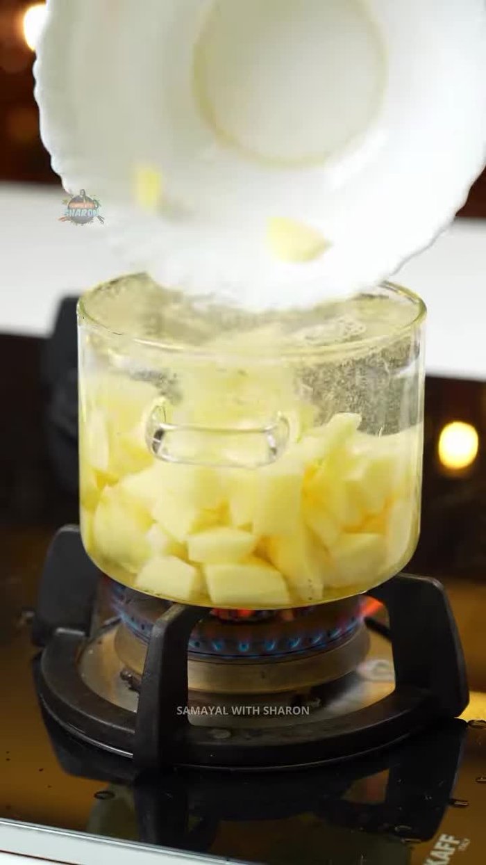 Wash the potatoes and fry them until they are floury.