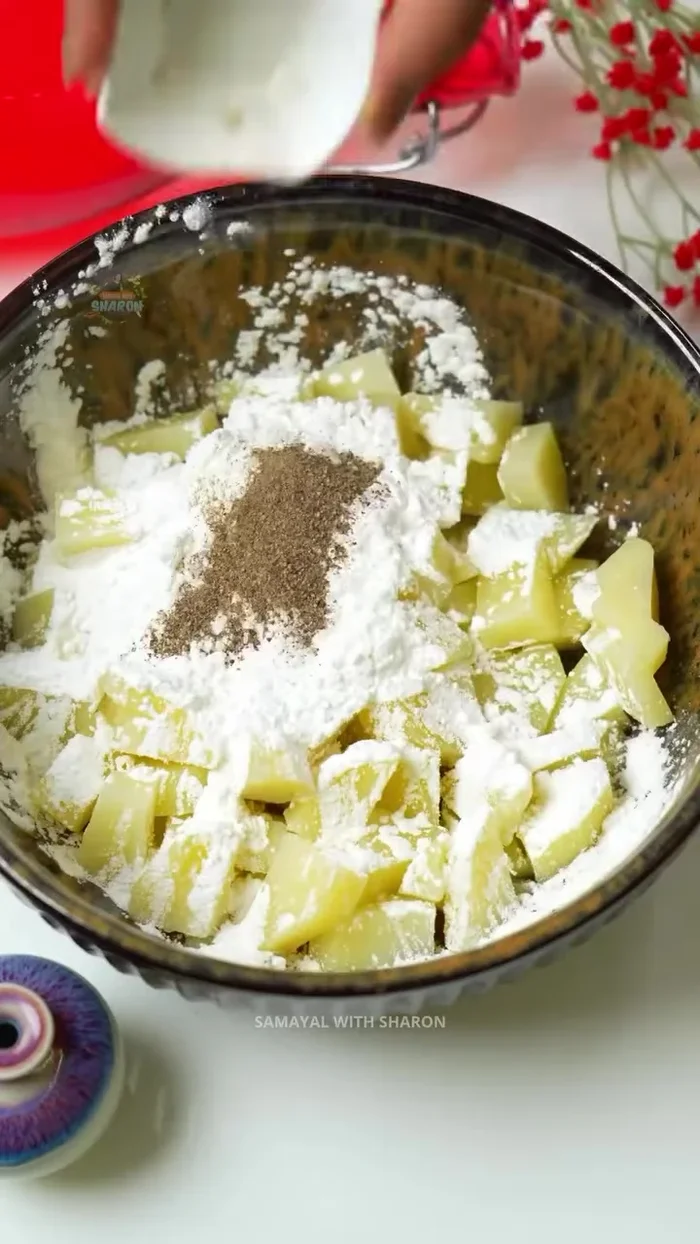 Mix the fried potatoes with 1 cup of cornflour, 1 teaspoon of salt, and 1 teaspoon of pepper. Knead until it resembles chapati dough.