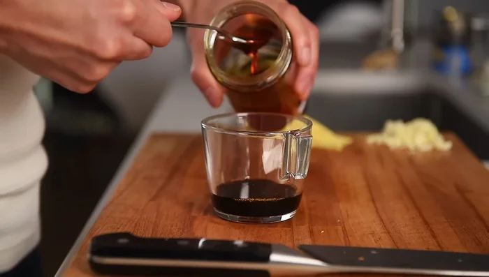 Make the sauce: combine 2 tbsp soy sauce, 1 tbsp dark soy sauce, 1 tbsp chili oil, 1 tbsp maple syrup, and 1 tbsp oyster sauce. Stir and set aside.