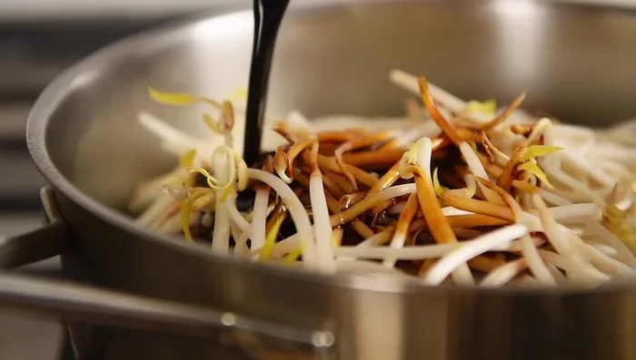 Pour in the sauce and cook for another couple of minutes to combine flavors.