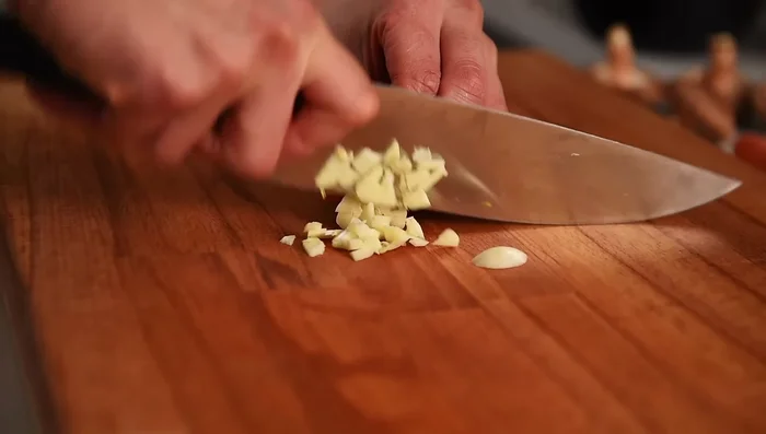 Chop two to three pieces of garlic.