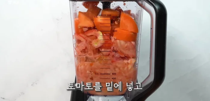 Blend tomatoes and carrots together. (Place tomatoes at the bottom and carrots on top for easier blending).