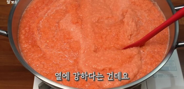 Boil the blended mixture over high heat, then reduce to medium heat and simmer for 30 minutes, stirring occasionally.