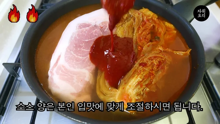 Add spicy stir-fried chicken sauce to taste.