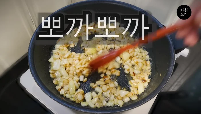 Add milk rice, chicken, and sorang (pre-made sauce). Stir well and cook for 3 minutes.