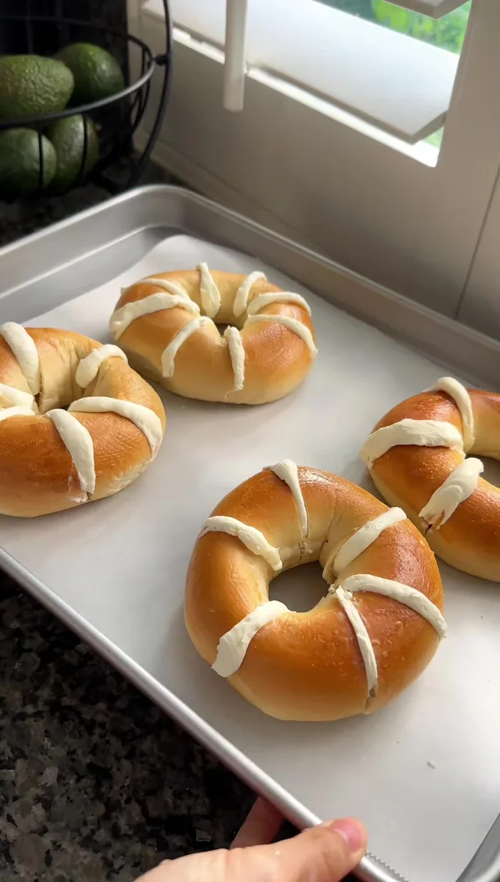 Dunk each bagel into the garlic butter custard mixture, letting excess drip off.