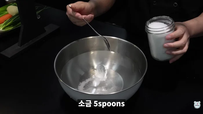 Dissolve salt in water.