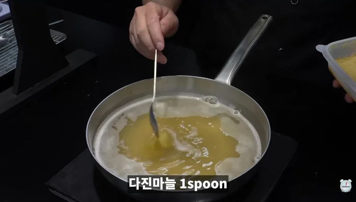 Prepare broth: Add anchovy dashi, clam dashi, anchovy sauce, and minced garlic to the water.