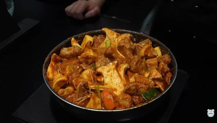 Cook slowly over medium heat, stirring occasionally, until potatoes are cooked.