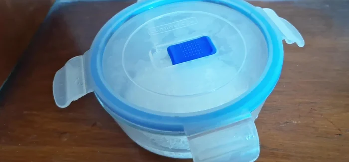 Soak the washed rice in enough water to fill your spray bottle. Do not overfill.