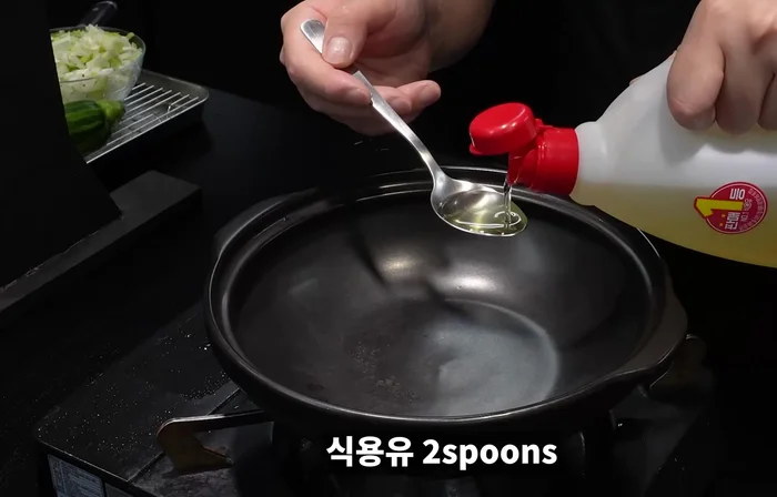 Add cooking oil to a pan.