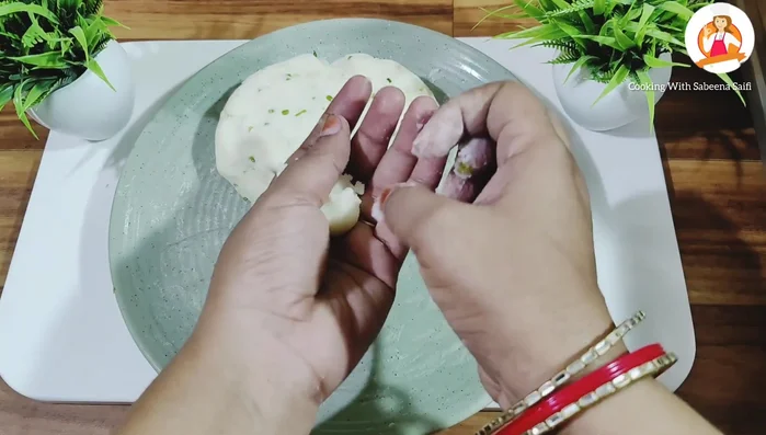 Roll the dough into small, round balls.