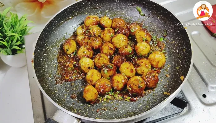 Stir in white sesame seeds.