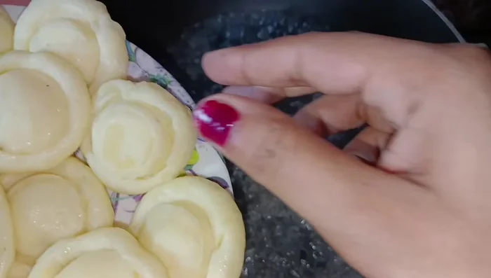 Bring a pot of water to a boil. Gently drop the potato balls into the boiling water. Cook for 1-2 minutes, or until they float to the surface.