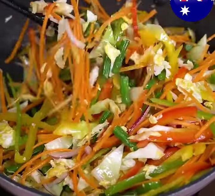 Add 3 cups of cooked rice, 1 teaspoon of salt, a pinch of sugar, and 6 tablespoons of soy sauce. Stir well to combine.