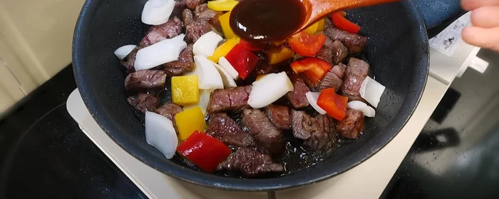 Add tonkatsu sauce, ketchup, and fire sauce. Mix well.