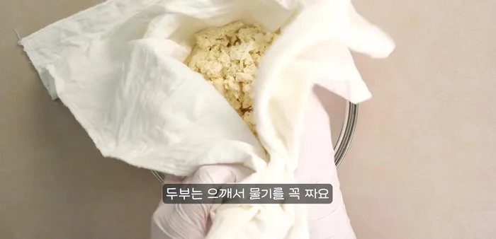 Mix the prepared tofu and potatoes with flour, egg, salt, pepper and any other desired seasonings.