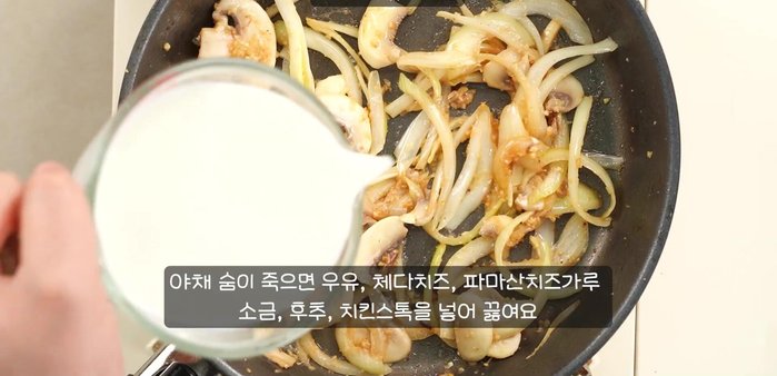 Pour the cream sauce over the cooked hambak steaks. Let it simmer for a few minutes to combine the flavors.