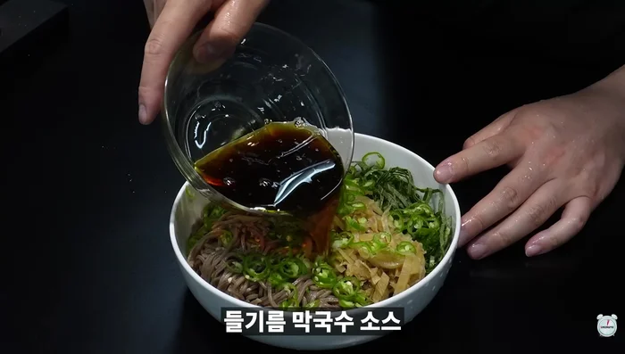 Pour the sauce over the noodles.