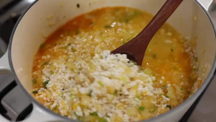 Bring to a boil, then reduce heat to low. Add the seared chicken, cover, and simmer for 15 minutes.